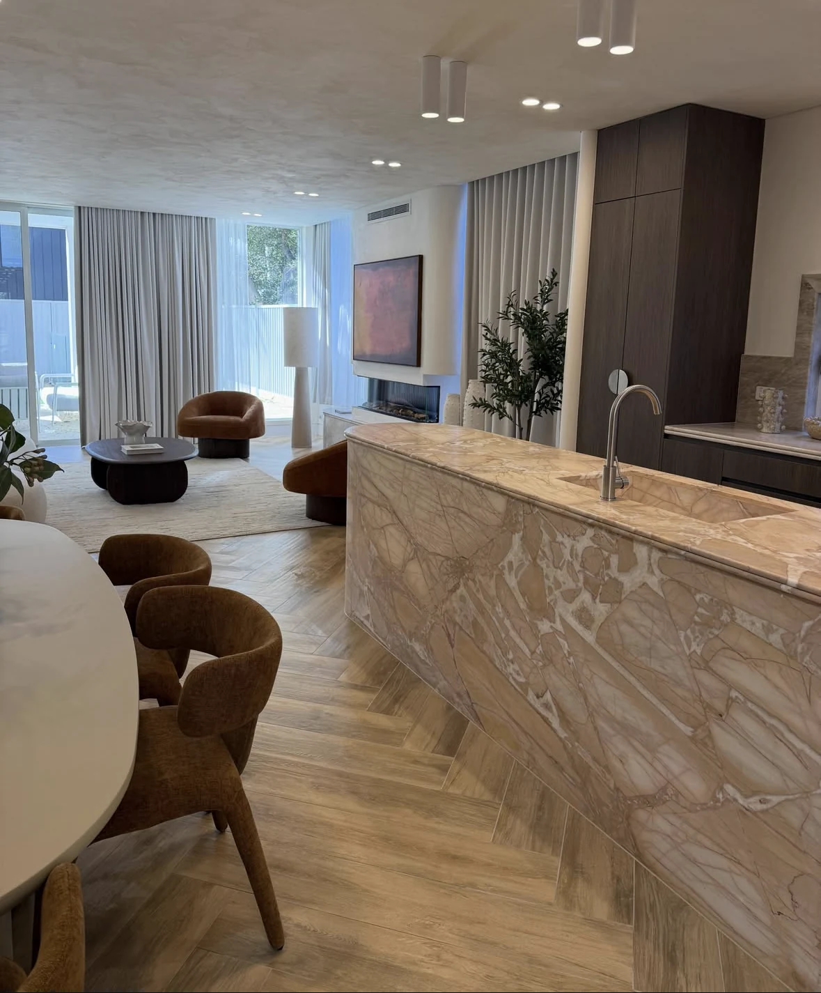 Marble kitchen and living space in a Marrickville home with completed painting and limewash